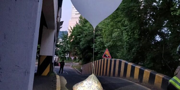 North Korea says it is halting sending trash balloons to South Korea after hundreds more float over border