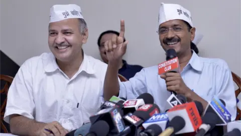 Getty Images Arvind Kejriwal with Manish Sisodia during a press conference for the General Assembly Elections 2013 held in New Delhi