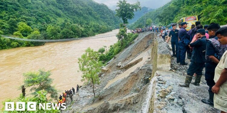 More than 60 missing as Nepal landslide sweeps buses into river