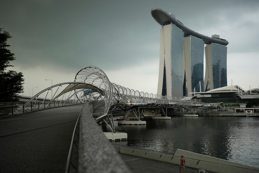 Storm clouds gather over the Marina Bay Sands casino and resort. 