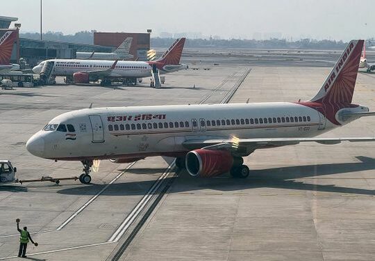 An Air India aircraft is pictured on the tarmac at the Indira Gandhi International airport in New Delhi.