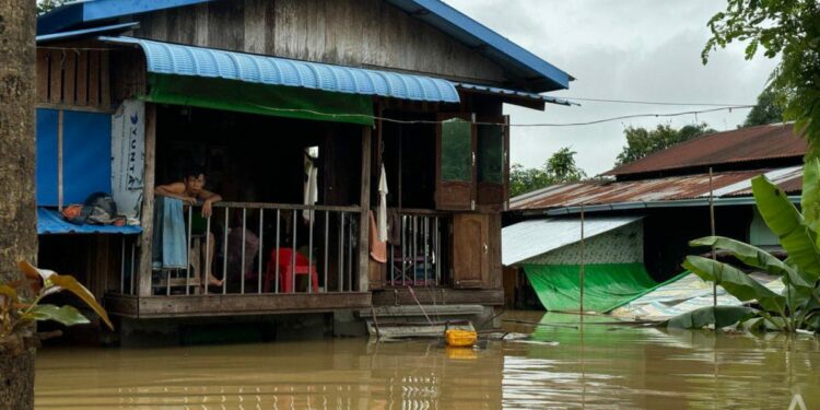 Double whammy for Myanmar residents facing floods, as help from military dwindles