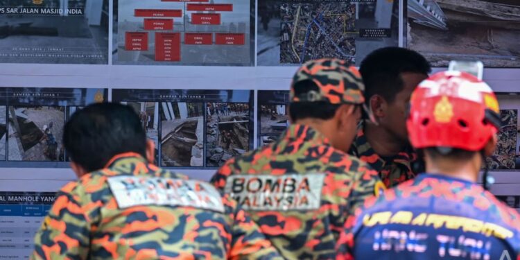 Kuala Lumpur cancels Merdeka eve celebration out of respect for sinkhole victim; Malaysia police chief says no need to declare area unsafe