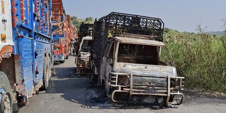 Pakistan reels after militants pull passengers out of buses on major highway and shoot them dead