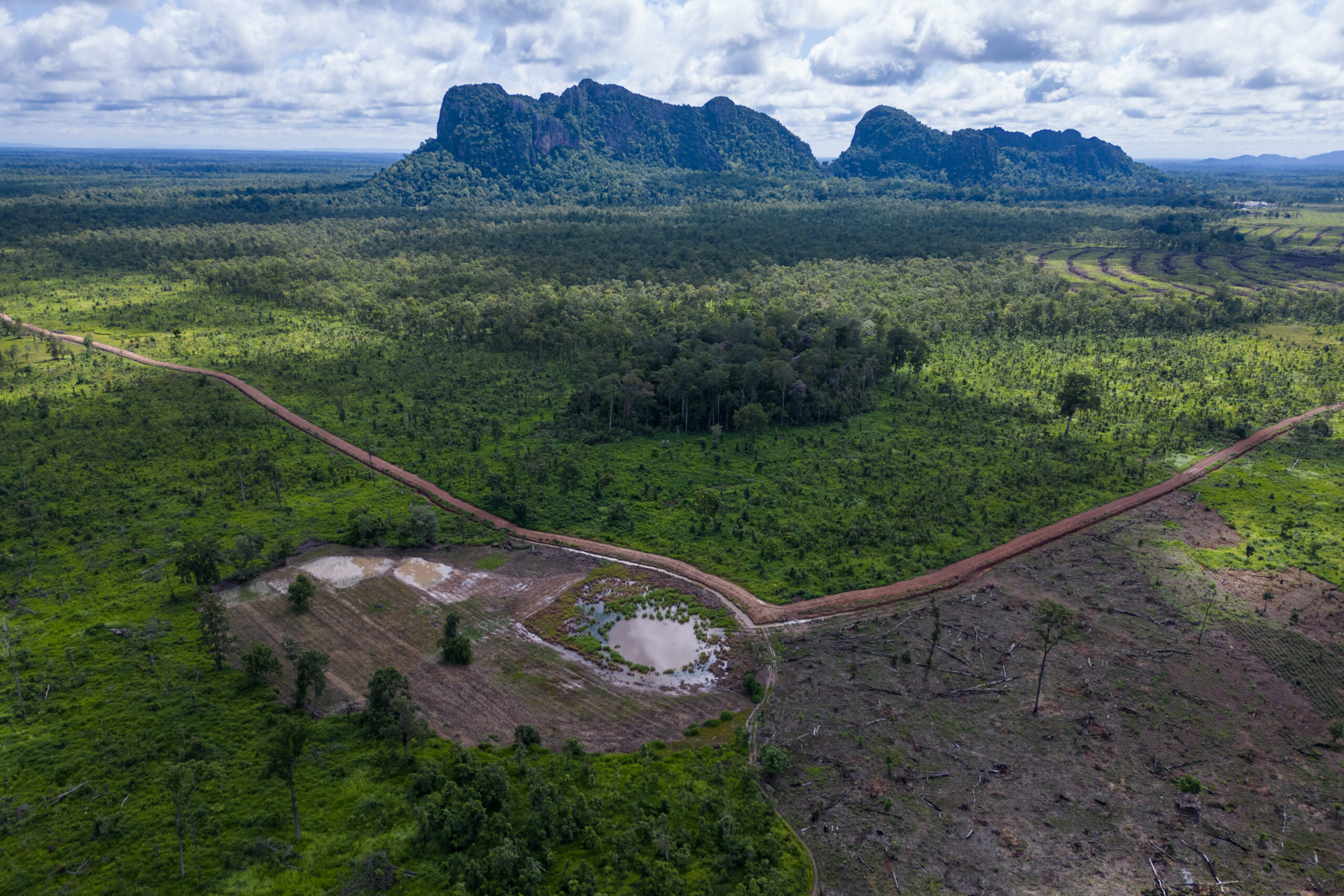 The border built between May and August 2024 encircles land inside Phnom Chum Rok Sat community forest claimed by two of Lin Vatey's board members along with their family and subordinates. Image by Gerald Flynn / Mongabay.