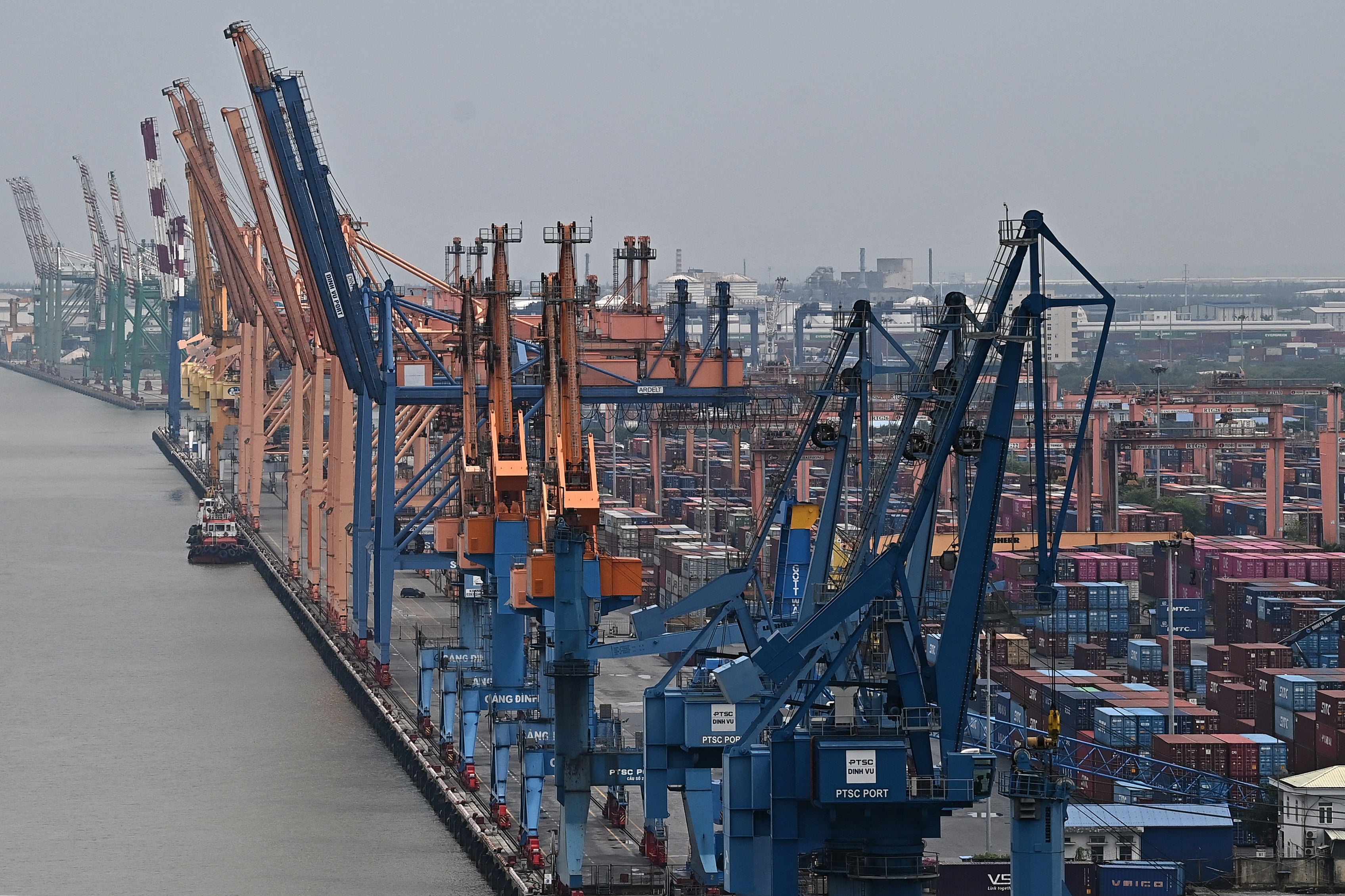 Inactive cranes and containers at the closed Dinh Vu port ahead of the approaching Typhoon Yagi in Hai Phong