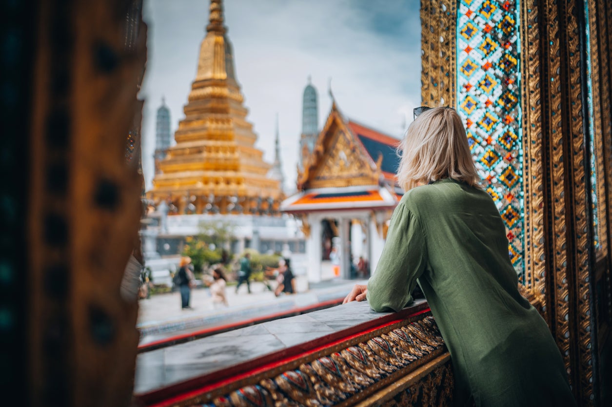 Shelter from the rain of the wet season in the Grand Palace, Bangkok