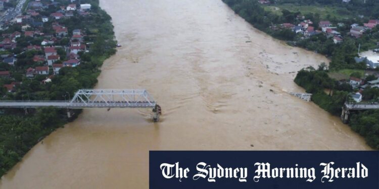 Vietnam storm deaths rise as bridge collapses, floods sweep bus away