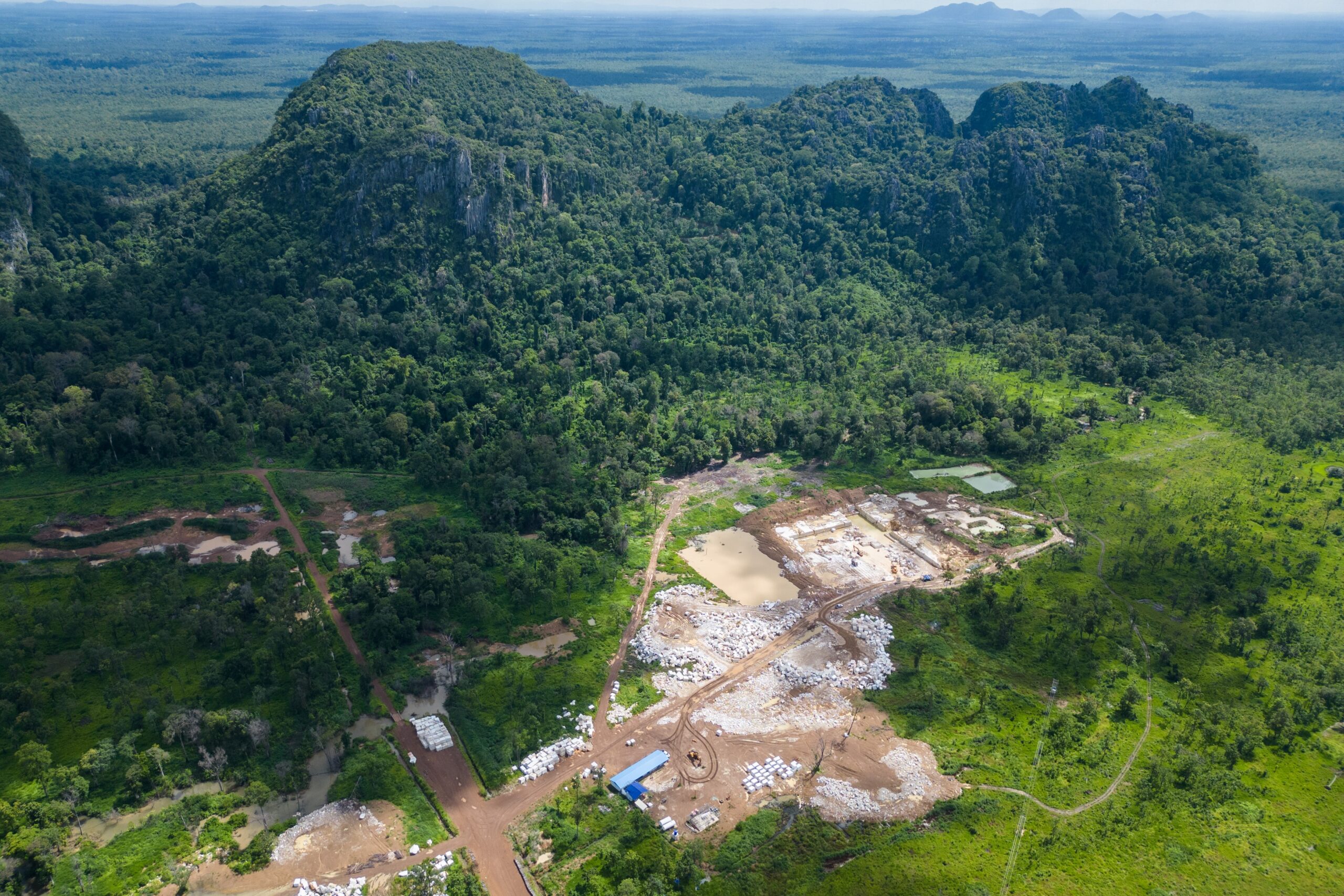 Lin Vatey's original mining site inside Phnom Chum Rok Sat threatens to consume the entire forest according to documents seen by Mongabay. Image by Gerald Flynn / Mongabay