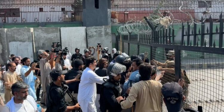 Police Clash With Protesters In Pakistan's Peshawar