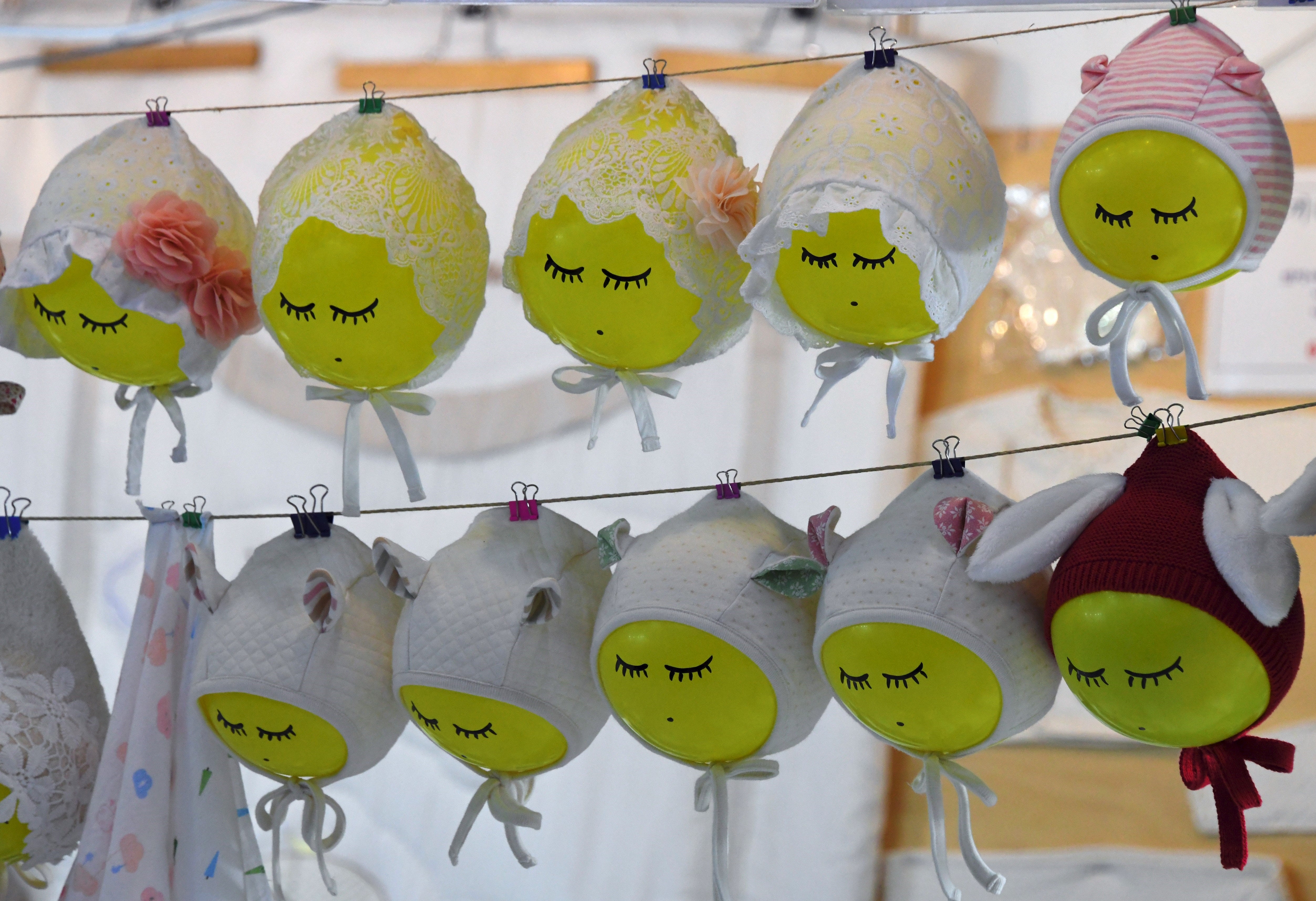 Baby bonnets displayed at a baby fair in Seoul.