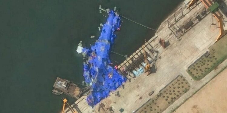North Korea deploys mystery balloon-like objects to stricken warship, satellite photos show – CNN